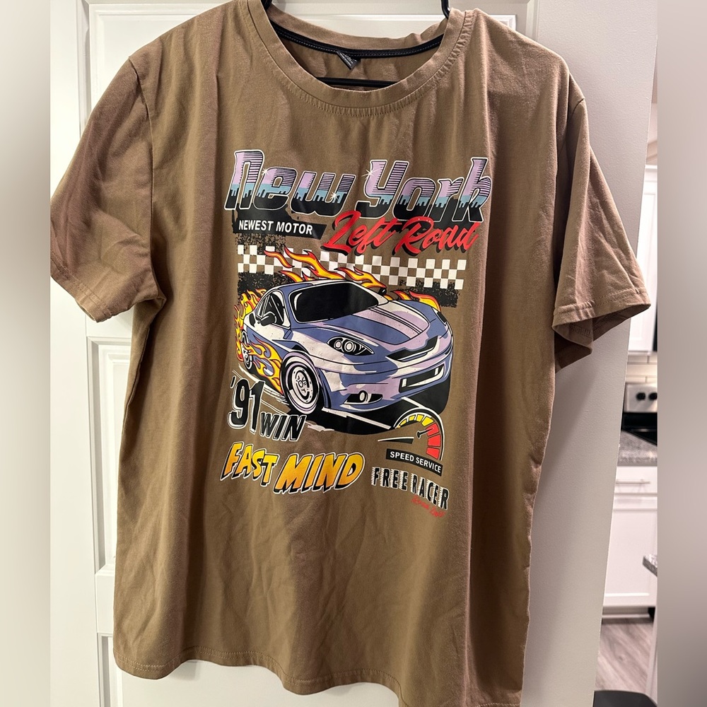 Nice race car shirt. Only worn 2 times great condition.